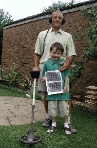 Man and his grandson who found buried treasure
